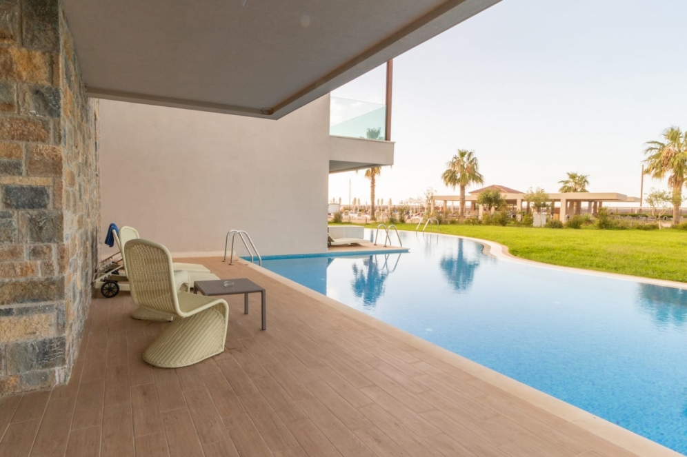 Almyros Beach Resort and Spa slide 4